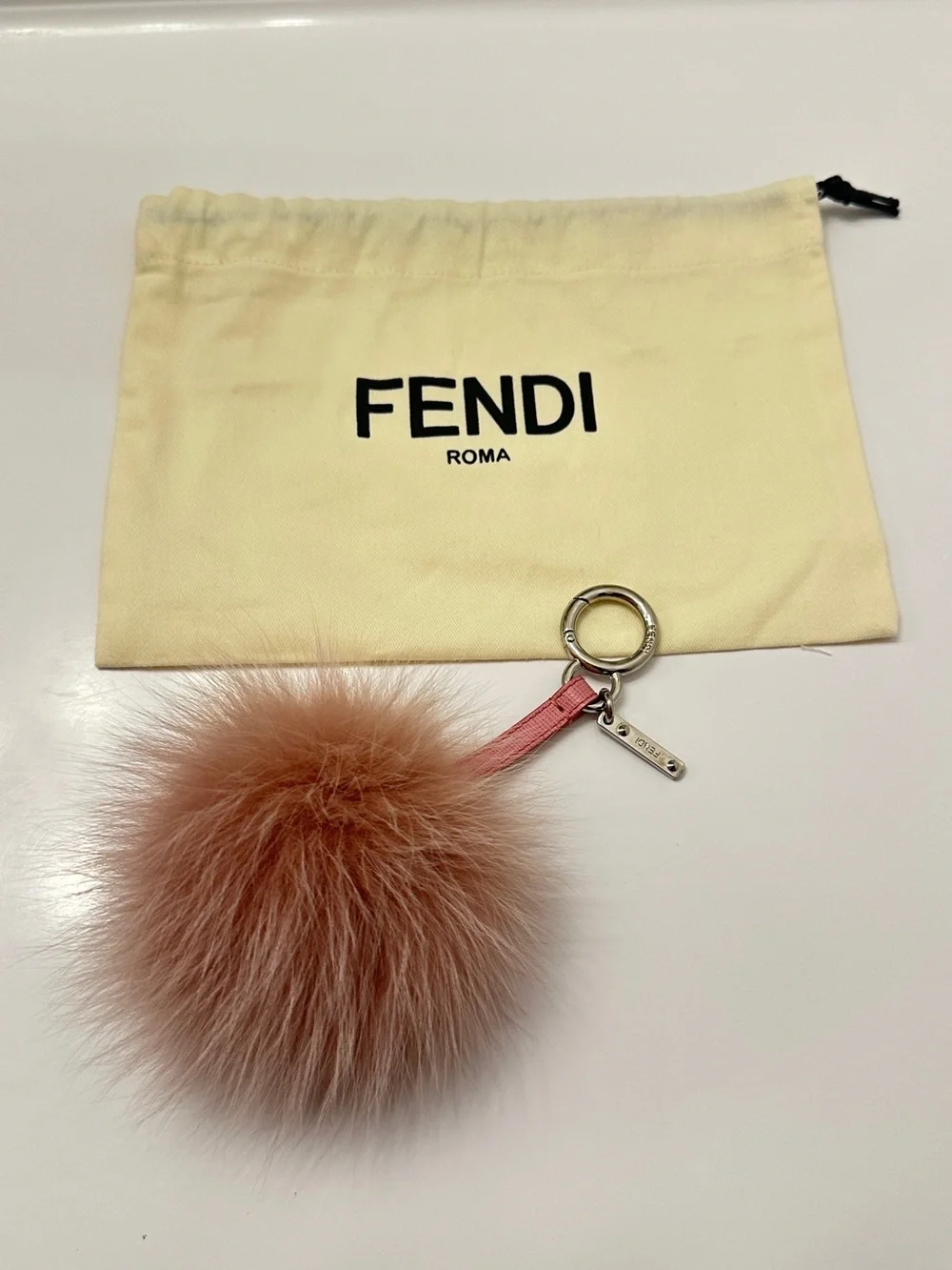 EUC Fendi Pom Pom Keychain in Dusty Pink